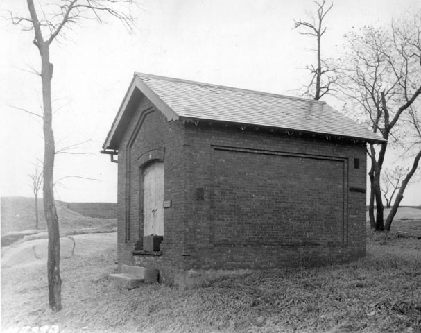 <p>Magazine (Building 113), built in 1885 and from ca. 1940 used as a blacksmith shop, looking east, mid-1930s.</p>