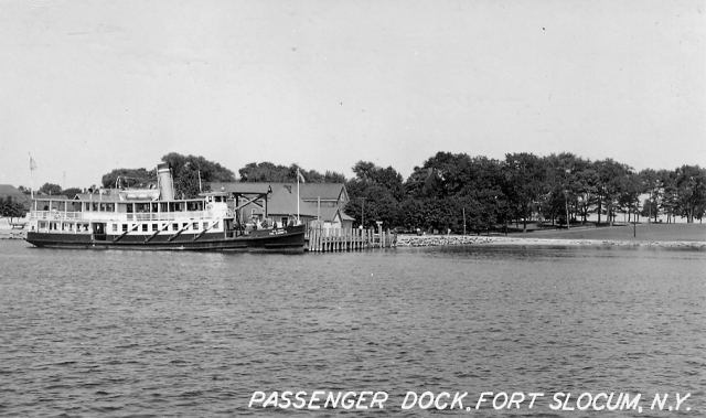<p>Passenger Dock in the mid-1930s, looking northeast. The Col. Barnett, a passenger-freight steamer, is tied up at the end of the pier.</p>