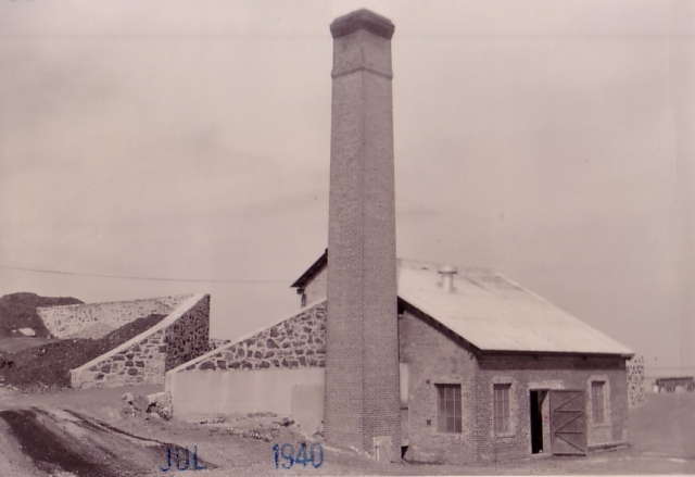 <p>Incinerator (Building 115), built in 1909, looking northeast, 1940, just after an enclosed work yard was added on its northern side.</p>