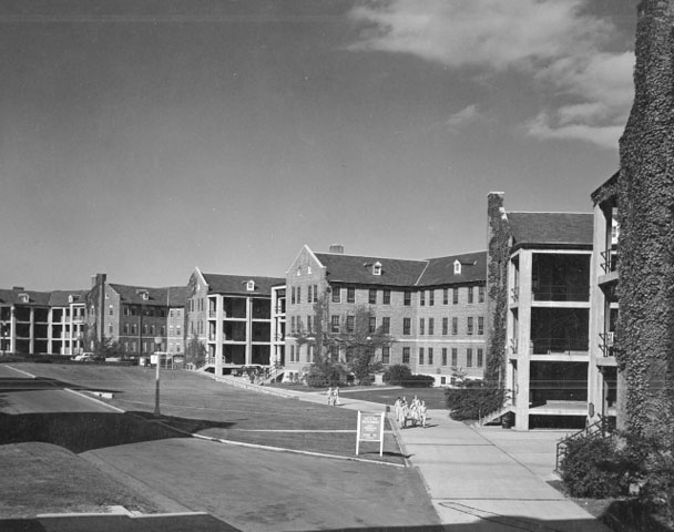 <p>Three barracks built in the 1930s (Buildings 58-60) dominated the eastern side of the Barracks Area, shown here looking north in the mid-1950s.</p>