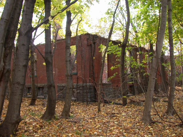 <p>Ruins of the Guardhouse (Building 56), north and west facades, looking southeast, November 2004.</p>