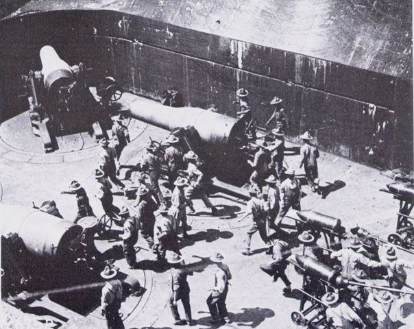 <p>The crowding of four mortar crews in a pit measuring about 40 by 60 feet, Battery Seminole, Fort Taylor, Key West, Florida, circa 1918.</p>