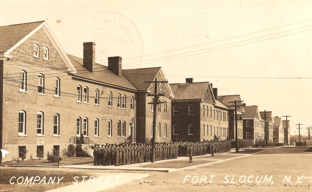 <p><strong>Colonial Revival</strong>: Altered examples of the style. Barracks (Buildings 64-61, left-right), built 1906-1909, shown after removal of wood porches in the late 1930s, view southeast, ca. 1941.</p>