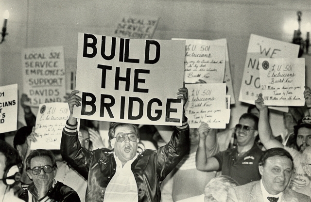 <p>Union members demonstrating at public meeting in support of a bridge that would have opened Davids Island to redevelopment, 1989 (collection of the Westchester County Histroical Society).</p>