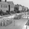 <p>The central section of the Barracks Area, showing three of four similar barracks built in 1906-1909, Buildings 62-64 (left-right), view southeast, mid-1950s.</p>