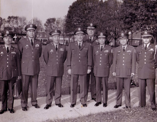 Colonel Frank Castagneto (center), Fort Slocum commander and commandant of the Army Information School, with Taiwanese officers and Information School staff in circa 1963.